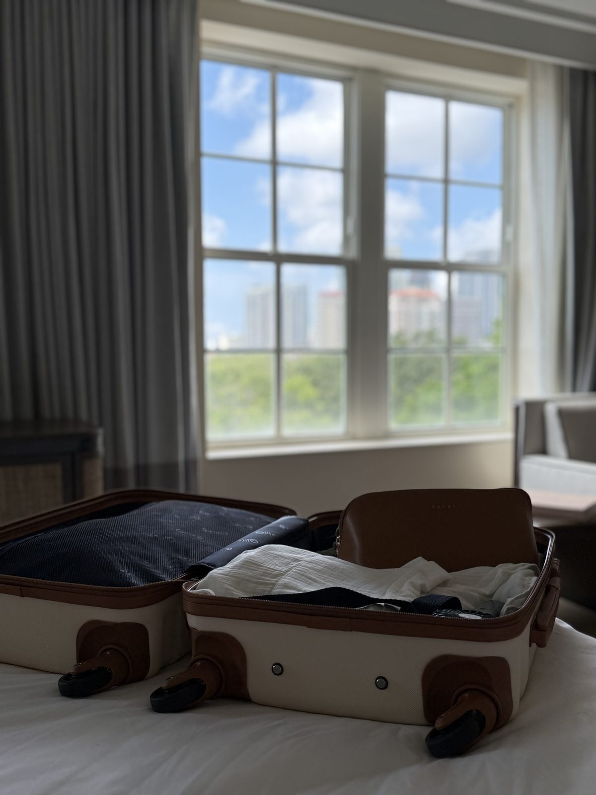 Open suitcase on the bed