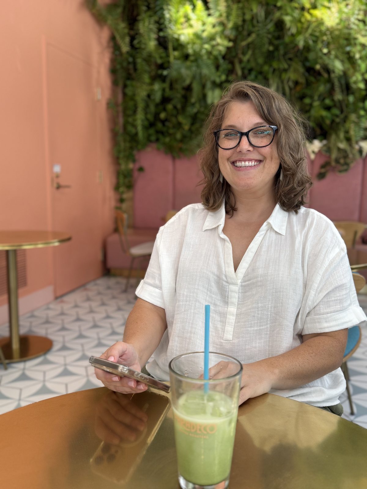Kate with a drink in hand