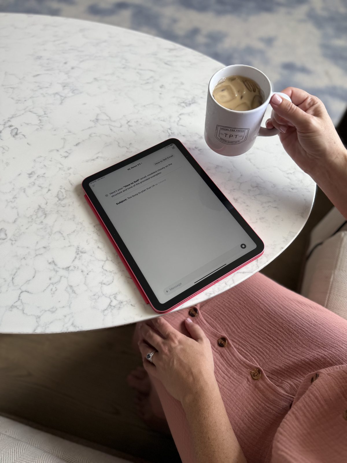 iPad and coffee on marble